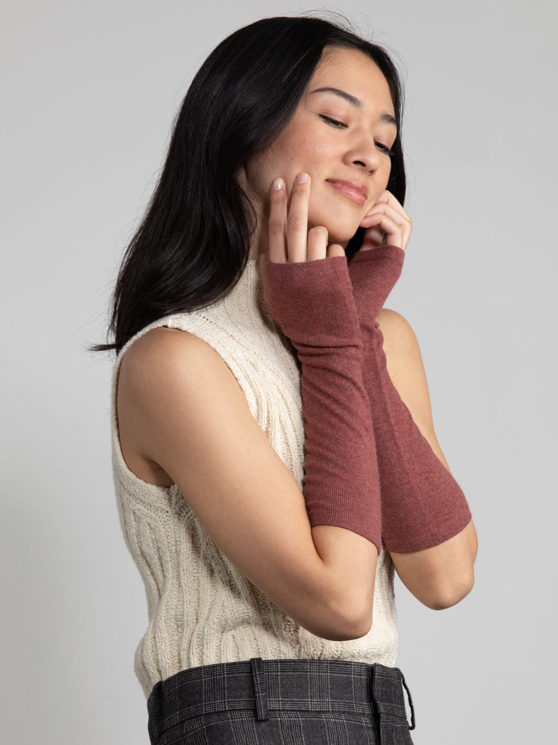 Woman wearing cashmere texting gloves.