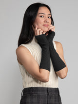 Woman wearing cashmere texting gloves.