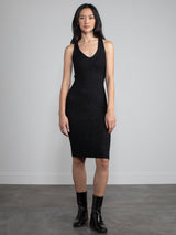 Woman wearing black sparkle dress. 