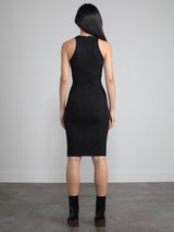 Woman wearing black sparkle dress. 