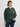 Women’s kale green button-front ribbed cardigan layered over button up blouse. 