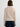 Woman wearing the St Bridget Jacket by Margaret O'Leary.