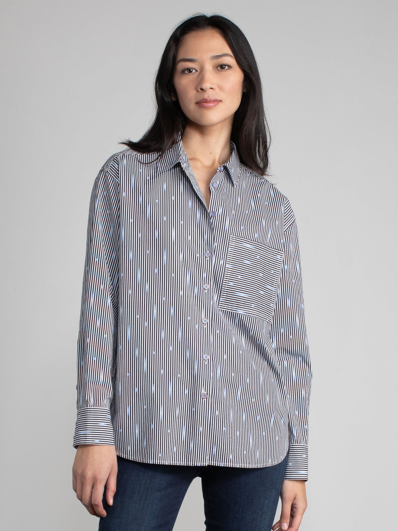 Woman wearing a cotton ikat shirt.