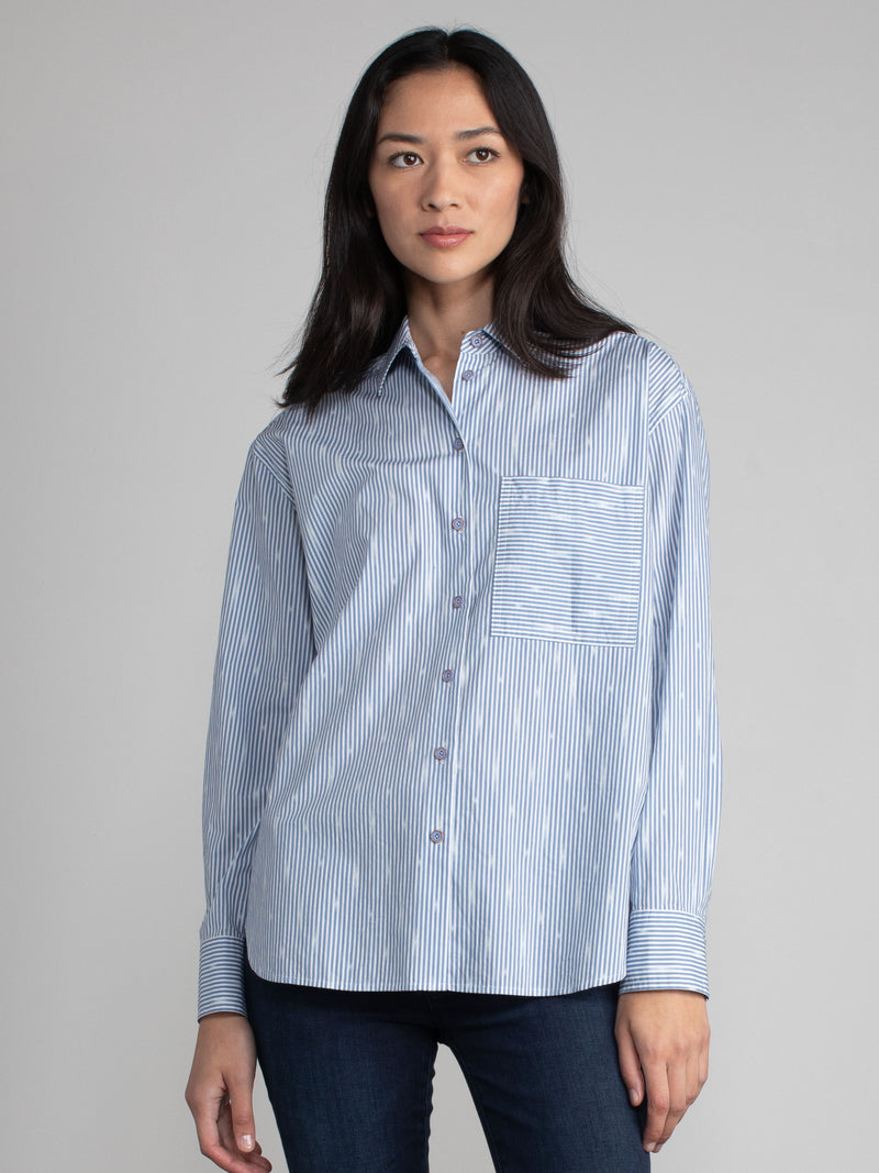 Woman wearing a cotton ikat shirt.