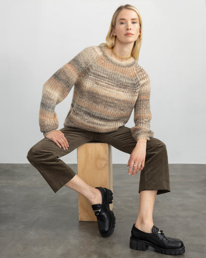 Woman wearing Sonoma Pullover in mush and the Cropped Flared Pant in olive made by Margaret O'Leary.