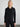Woman wearing the St Bridget Jacket by Margaret O'Leary.