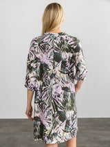 Woman wearing the Paola Printed Dress in Dark Tropical by Margaret O'Leary.