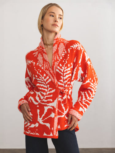 Woman wearing the Jacquard Jacket in Tomato by Margaret O'Leary.o