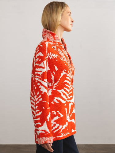 Woman wearing the Jacquard Jacket in Tomato by Margaret O'Leary.o