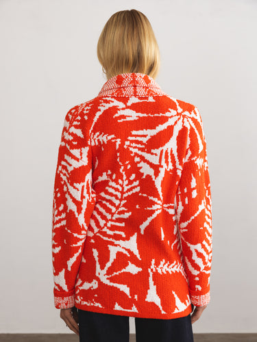 Woman wearing the Jacquard Jacket in Tomato by Margaret O'Leary.o