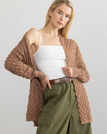 Woman wearing Open 3D Coat in nut  with the square neck tank in white inside made by Margaret O'Leary.