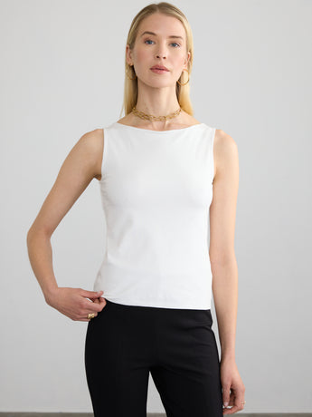 Woman wearing the Boat Neck Tank in white by Margaret O'Leary.