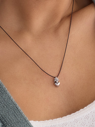 The PAVE DIAMOND SACRED HEART NECKLACE by Feathered Soul.