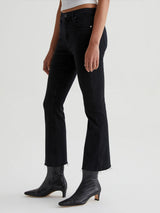 Woman wearing the Farrah Boot Crop Jean in Sulfer Black by AG Jeans.