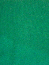 The cashmere travel wrap in emerald by Margaret O'Leary.