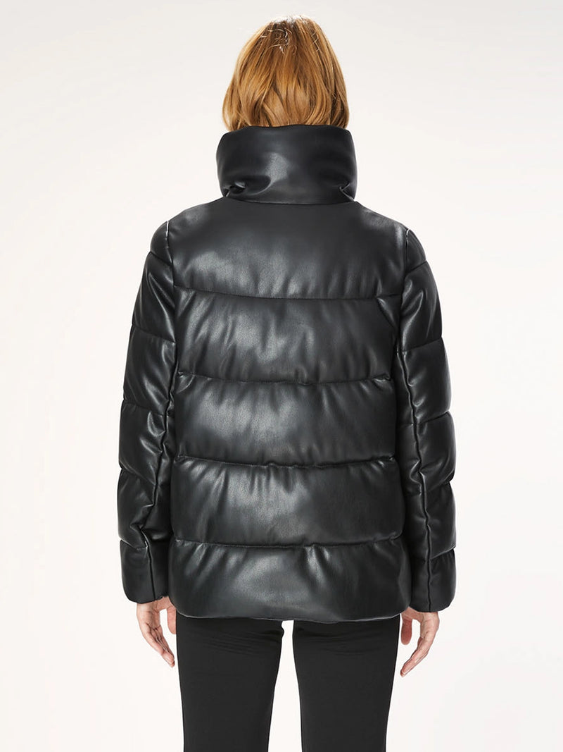 Woman wearing a black puffer jacket.