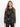 Woman wearing the Evelina Metallic Blouse by Johnny Was.
