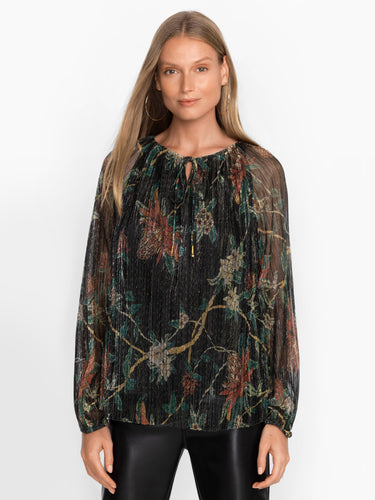 Woman wearing the Evelina Metallic Blouse by Johnny Was.