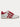 White and red sneaker by Back 70 on a white background