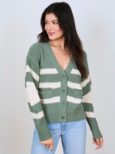 Woman wearing the Barrel Sleeve Cardi by Margaret O'Leary.