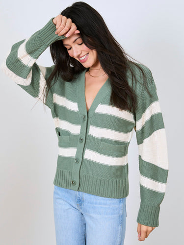 Woman wearing the Barrel Sleeve Cardi by Margaret O'Leary.