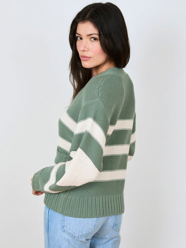 Woman wearing the Barrel Sleeve Cardi by Margaret O'Leary.