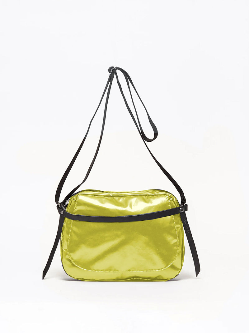 The Happy Light Shoulder Bag in Citron by Jack Gomme.