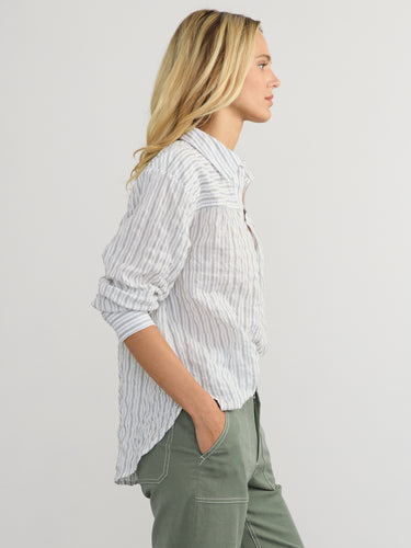Woman wearing the Marina Popover Shirt by Margaret O'Leary.