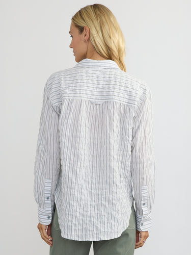 Woman wearing the Marina Popover Shirt by Margaret O'Leary.