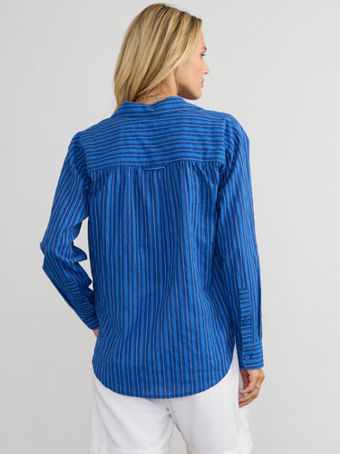 Woman wearing the Marina Popover Shirt by Margaret O'Leary.
