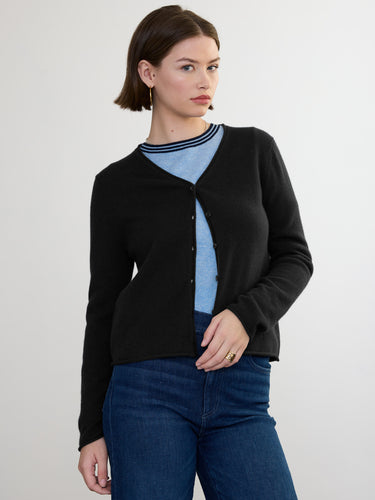 Woman wearing the Cashmere Vee Cardigan by Margaret O'Leary.