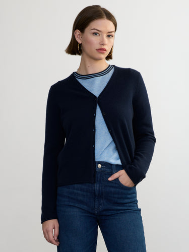 Woman wearing the Cashmere Vee Cardigan by Margaret O'Leary.