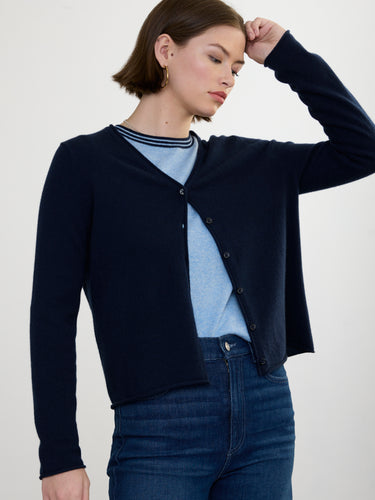 Woman wearing the Cashmere Vee Cardigan by Margaret O'Leary.