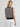 Woman wearing the Caroline Vest by Margaret O'Leary.