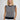Woman wearing the Caroline Vest by Margaret O'Leary.