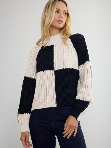 Woman wearing the Chessboard Pullover by Margaret O'Leary.