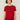 Woman wearing a red Cashmere Tee by Margaret O'Leary against a plain background