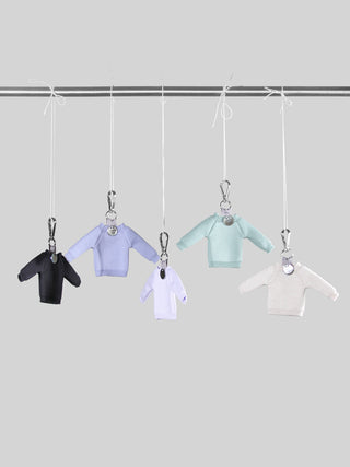 The Sweater Bag Charm by Margaret O'Leary.