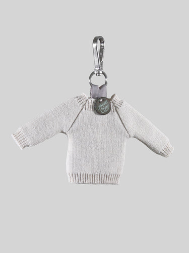 The Sweater Bag Charm by Margaret O'Leary.