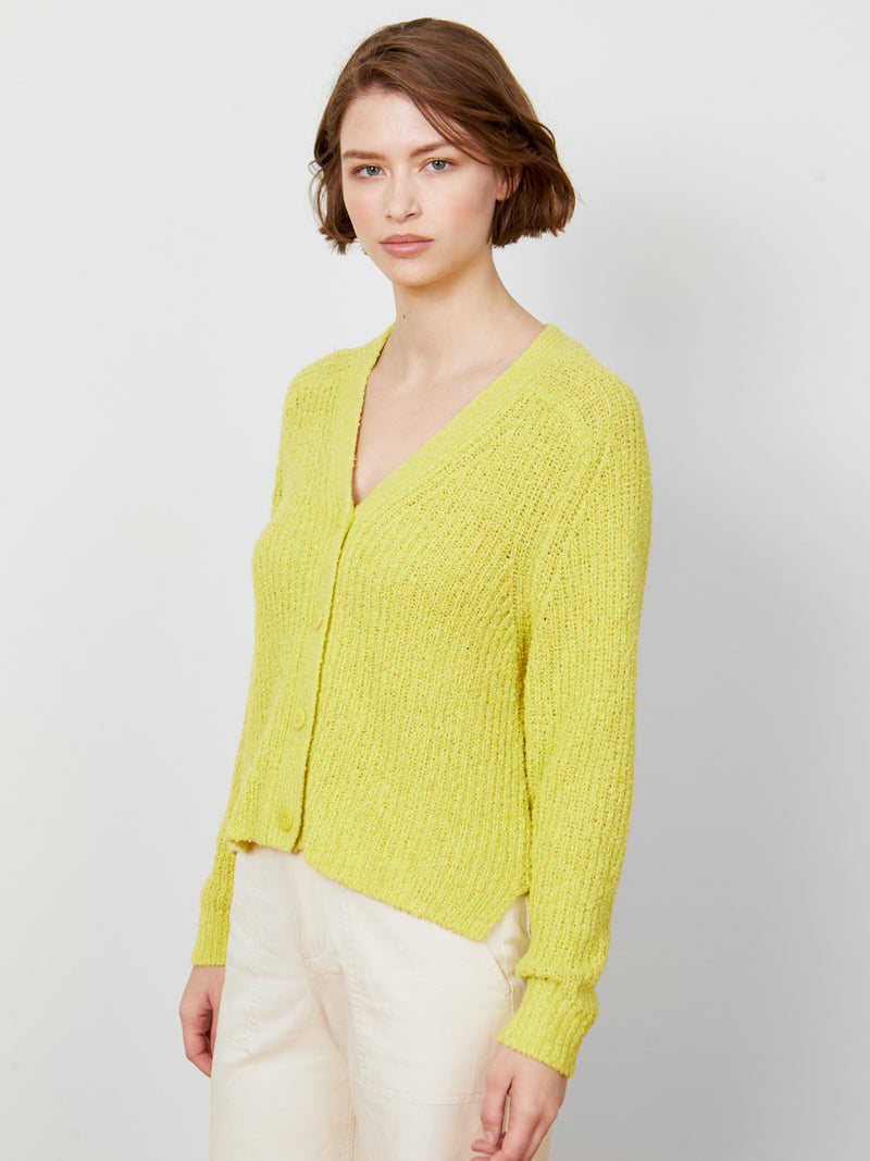 Woman wearing the Hadley Cardigan in Citrine by Margaret O'Leary.