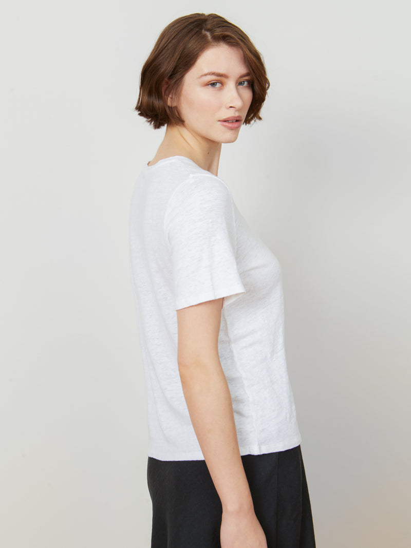 Woman wearing the Frances Short Sleeve Tee in White by Margaret O'Leary.