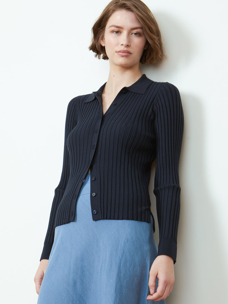 Woman wearing the Slim Ribbed Cardi by Margaret O'Leary.
