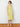 Woman wearing the Calistoga Double Strap Dress in Lemongrass by Margaret O'Leary.