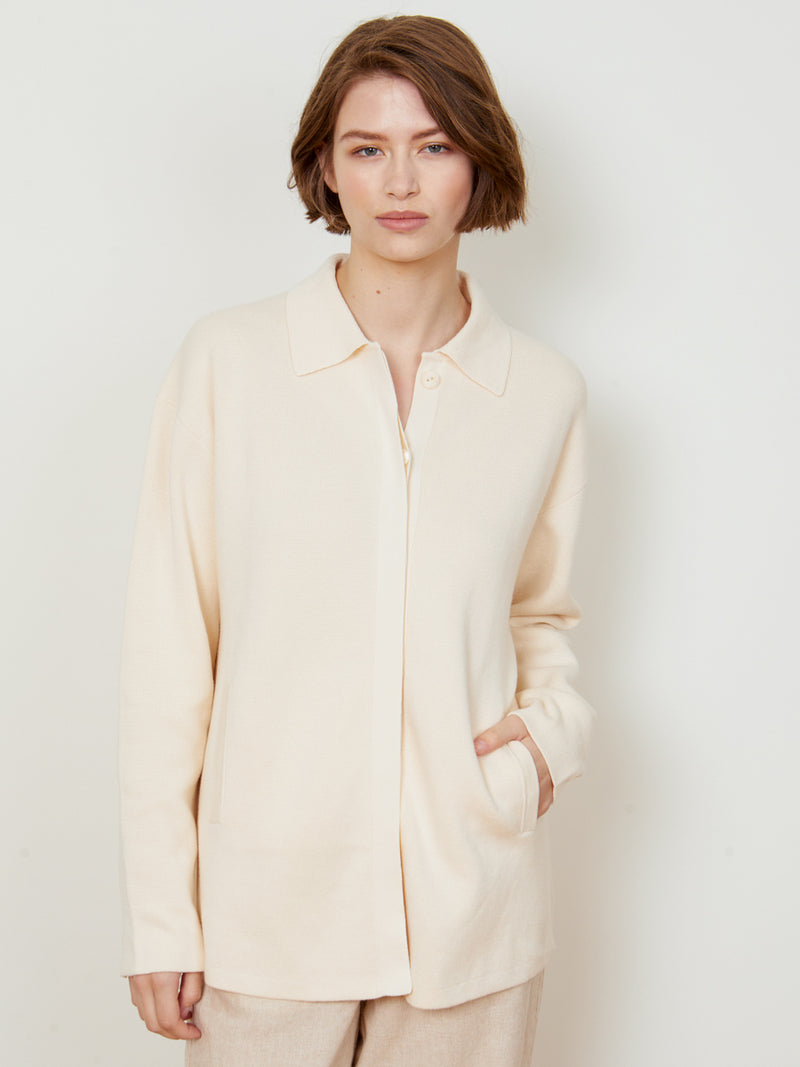 Woman wearing the Cotton Shacket in Ivory by Margaret O'Leary.