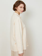 Woman wearing the Cotton Shacket in Ivory by Margaret O'Leary.
