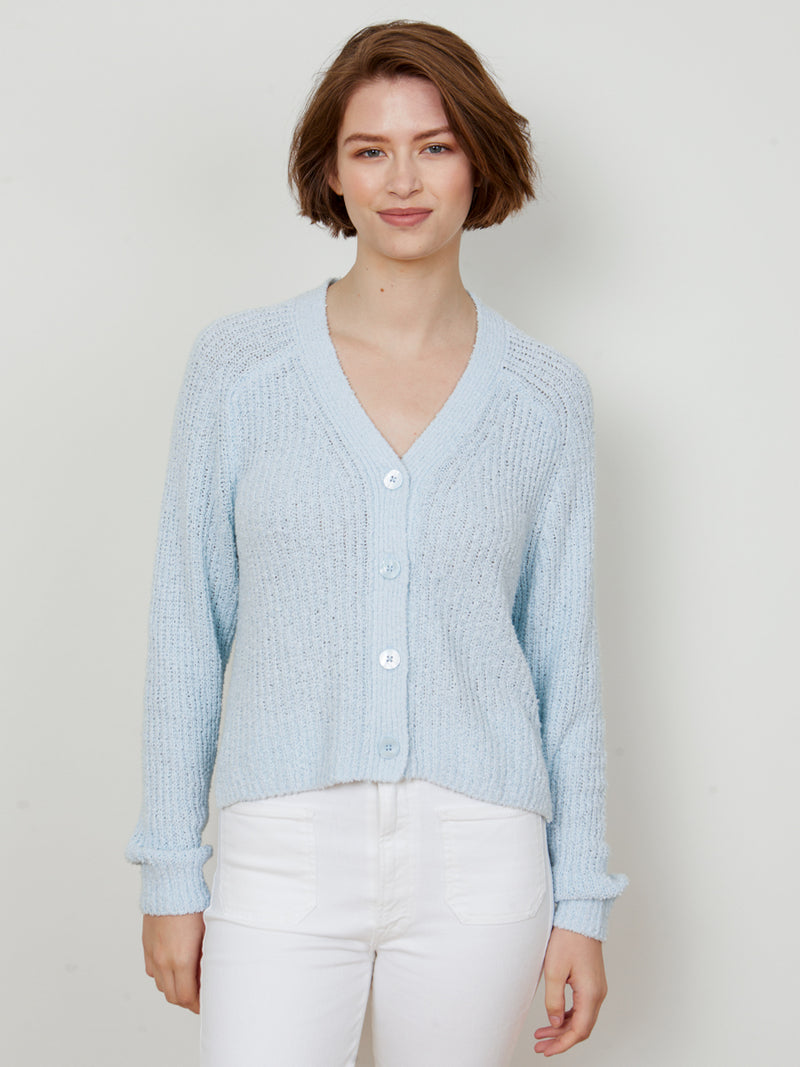 Woman wearing the Hadley Cardigan in Frost by Margaret O'Leary.