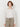 Woman wearing the Long Sleeve Tee in Eco Stripe by Margaret O'Leary.