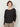 Woman wearing the Long Sleeve Tee in Eco Black by Margaret O'Leary.