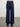 Person wearing the Cashmere Sweats, a blue cashmere sweat pant by Margaret O'Leary