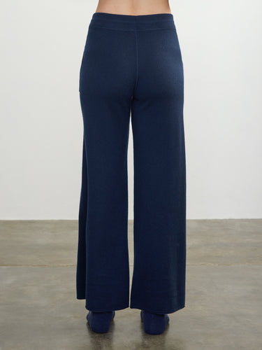 Person wearing the Cashmere Sweats, a blue cashmere sweat pant by Margaret O'Leary